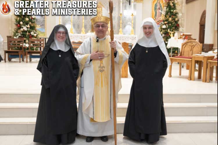 Sister Chiara Therese after taking perpetual vows and Novice Sister Lucia Rose shortly receiving monastic robes